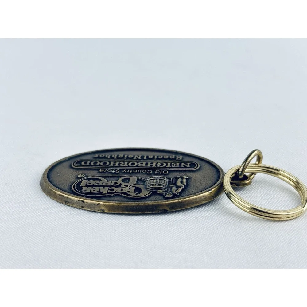 Cracker Barrel Neighborhood Special Neighbor Metal Keychain Brass Country